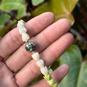 Pakalana, Mother of Pearl Pīkake flower, Pāua Mosaic, & Sterling silver bracelet
